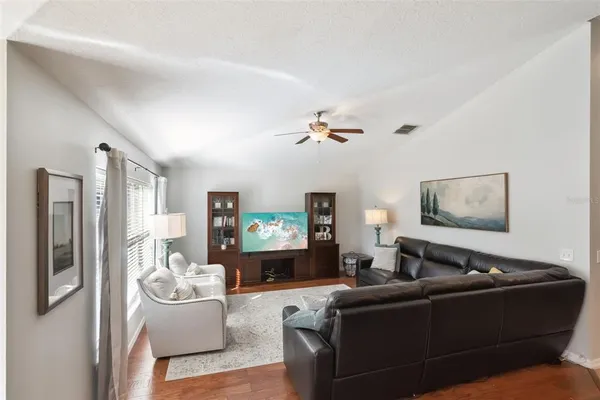 a living room with furniture and a couch