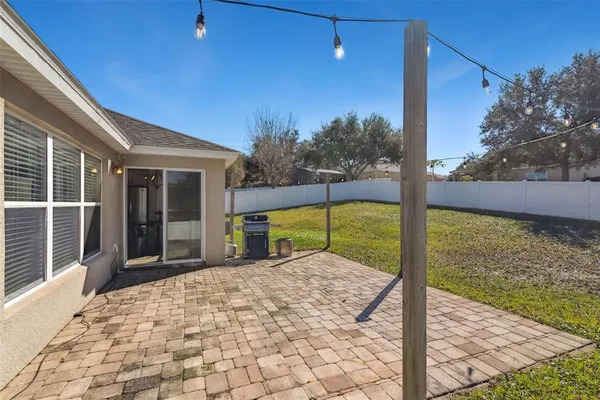 a view of a backyard with a garden