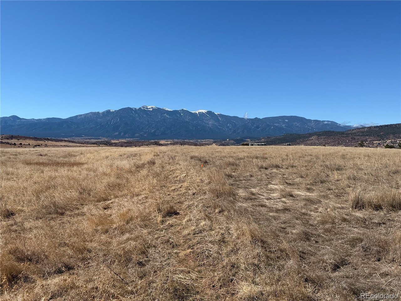 168 East Routt Street Colorado City, CO 81019 - Photo 3 of 7 a view of an lake with a mountain in the background