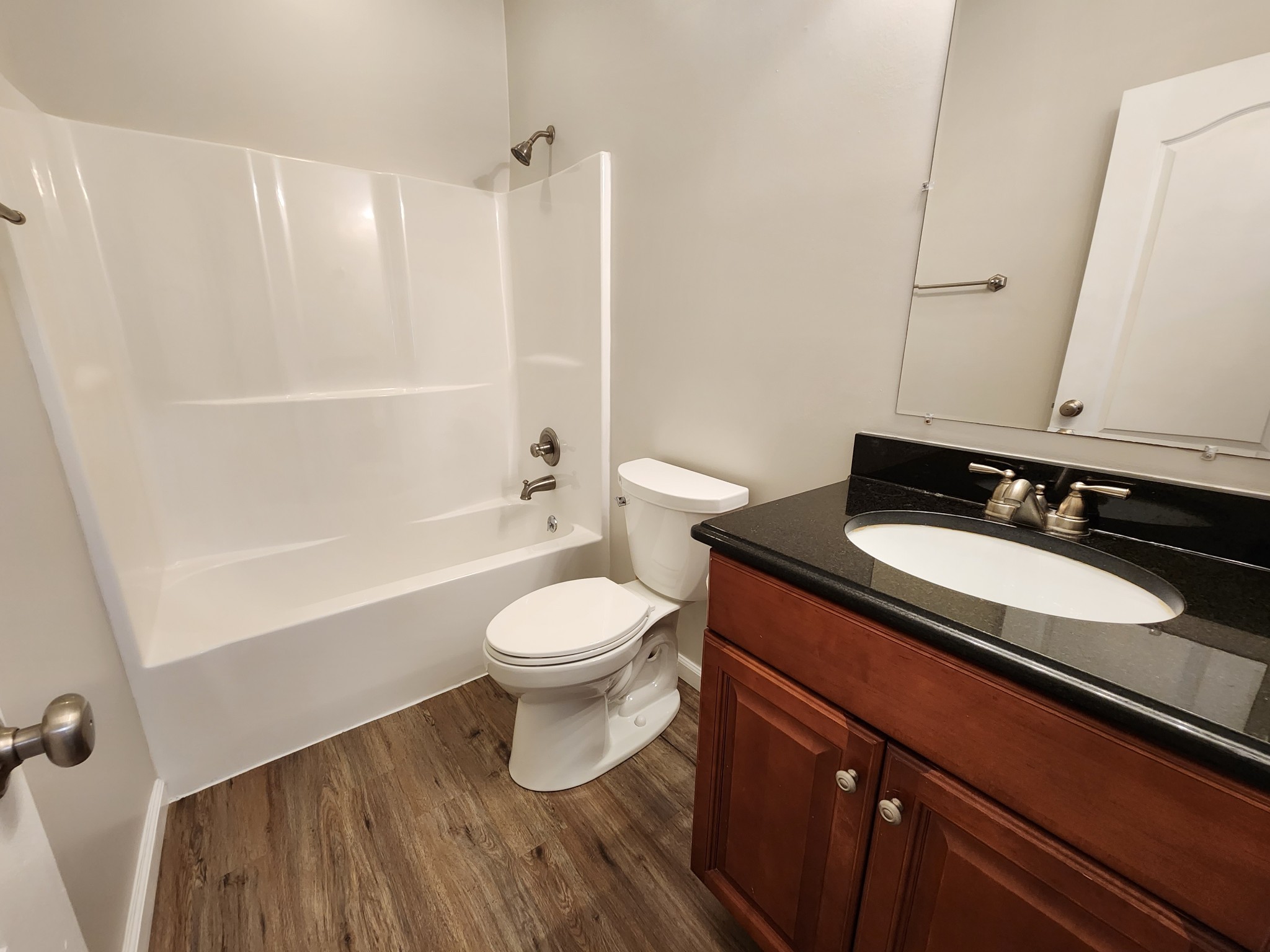 1415 Williamson Road, Unit B Goodlettsville, TN 37072 - Photo 11 of 18 a bathroom with a sink a toilet and shower