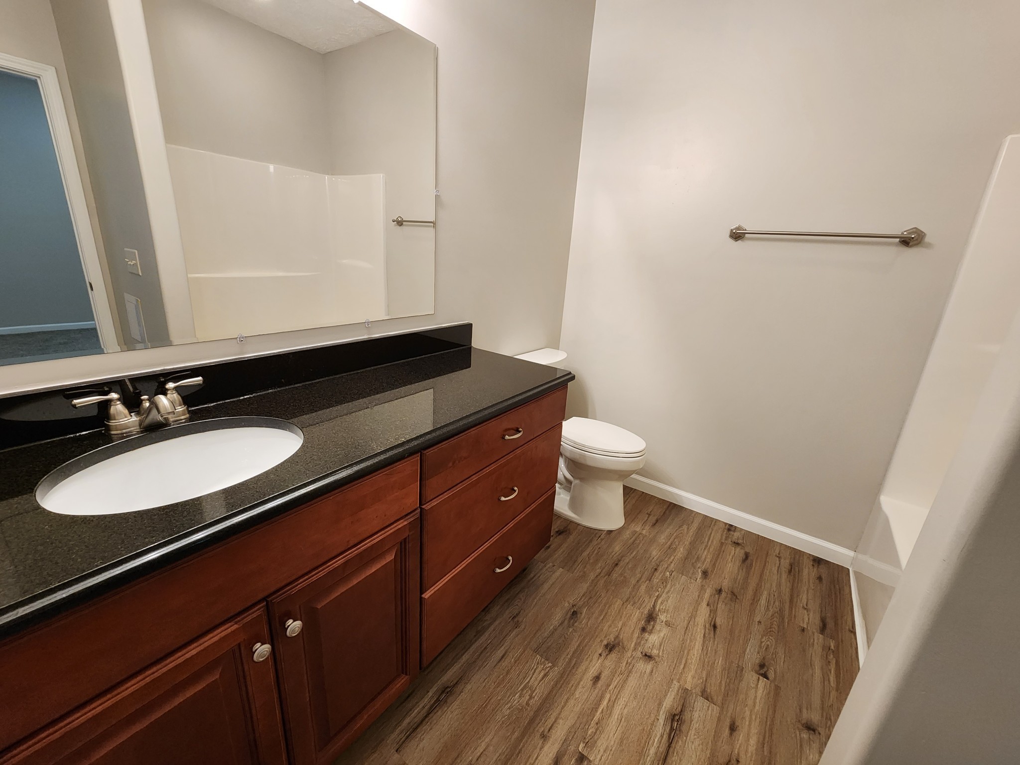 1415 Williamson Road, Unit B Goodlettsville, TN 37072 - Photo 14 of 18 a bathroom with a sink and a mirror
