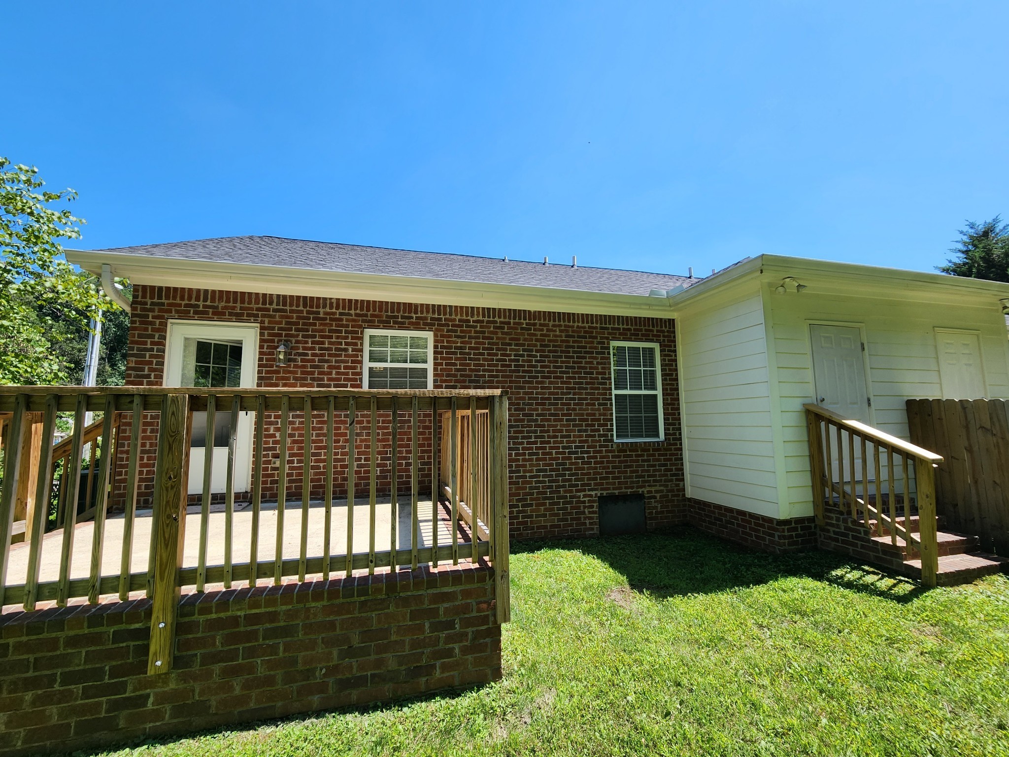 1415 Williamson Road, Unit B Goodlettsville, TN 37072 - Photo 15 of 18 a front view of a house with a yard