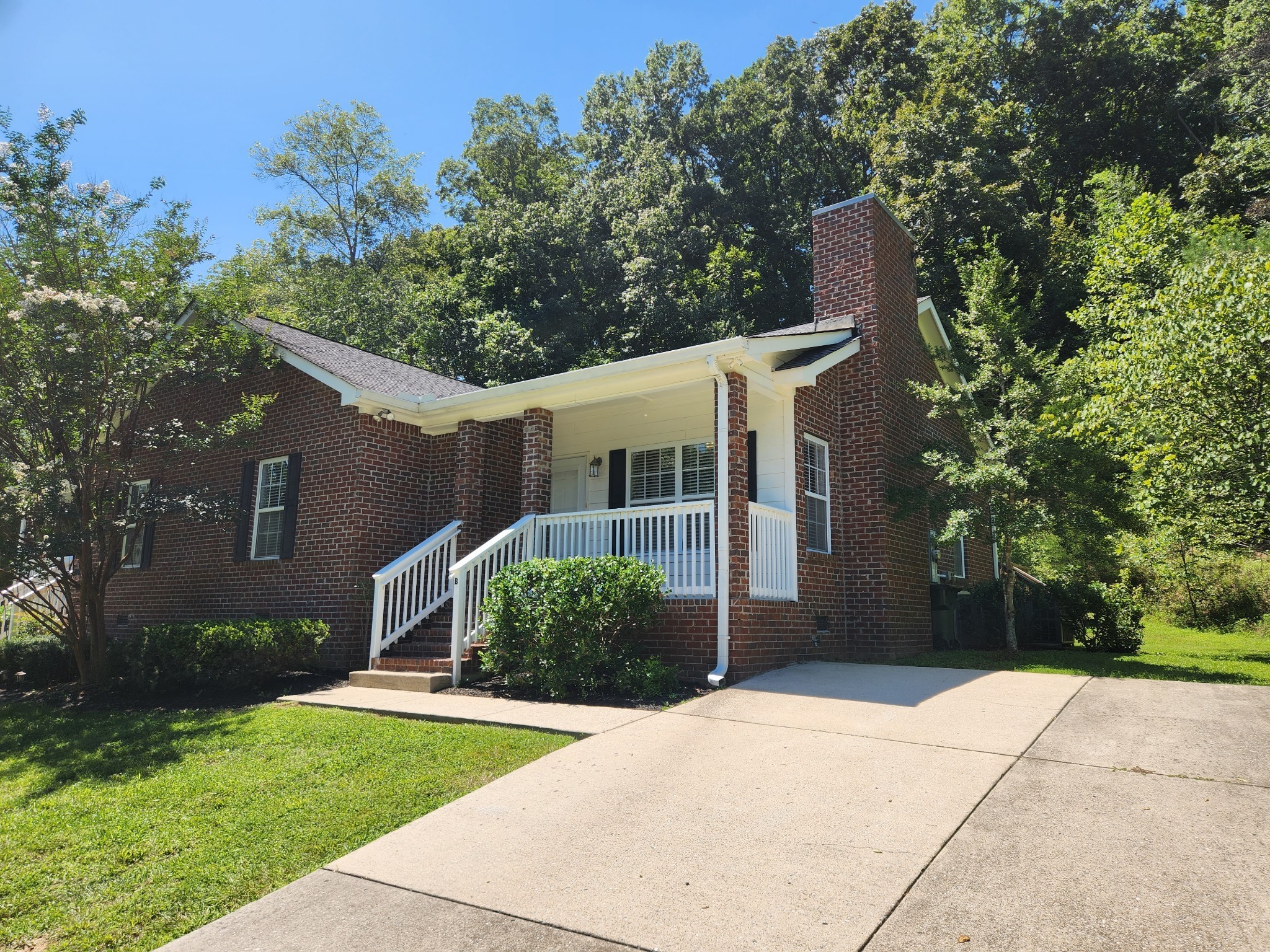 1415 Williamson Road, Unit B Goodlettsville, TN 37072 - Photo 17 of 18 front view of a house with a yard