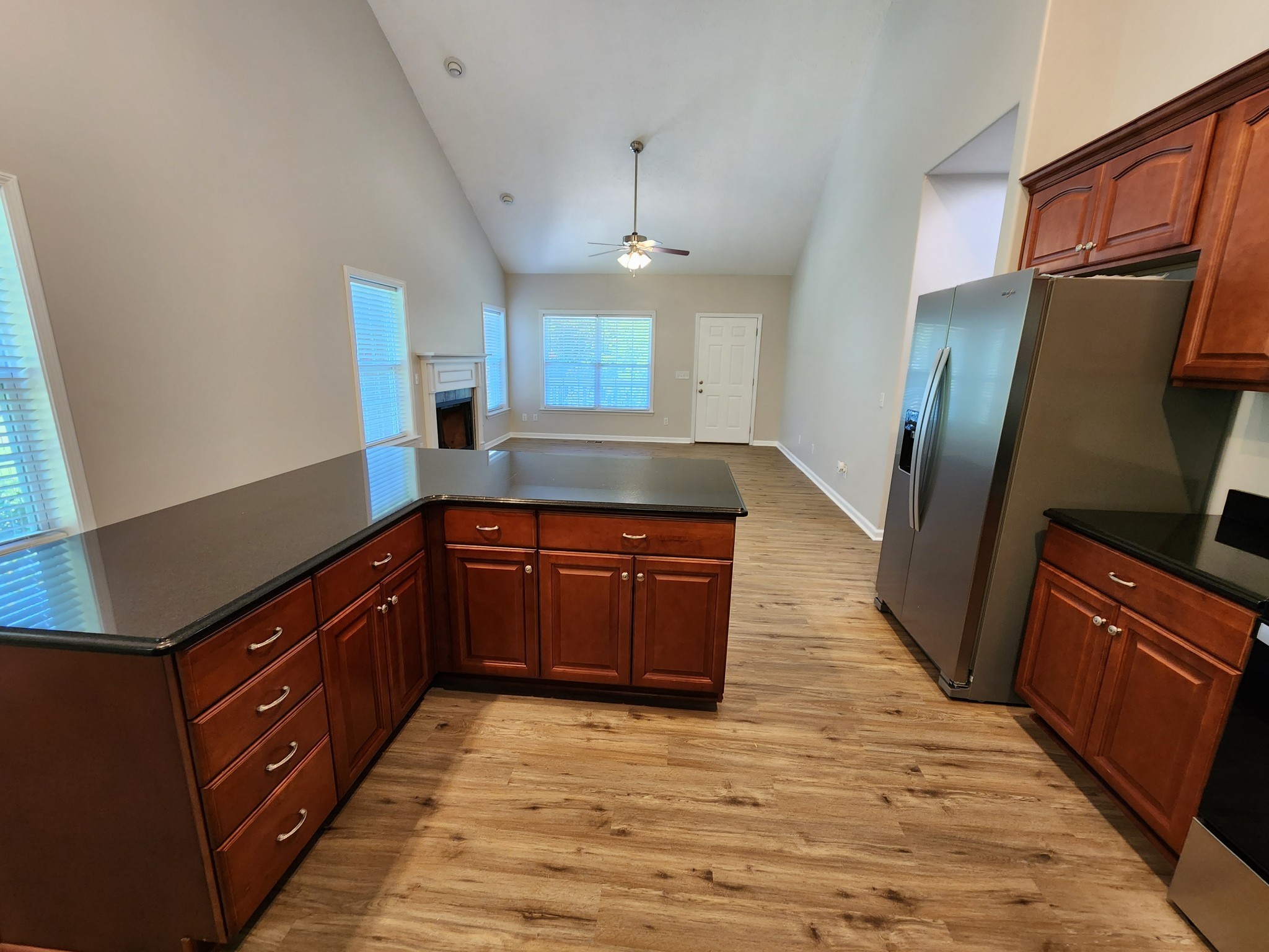 1415 Williamson Road, Unit B Goodlettsville, TN 37072 - Photo 5 of 18 a kitchen with granite countertop a refrigerator and a sink