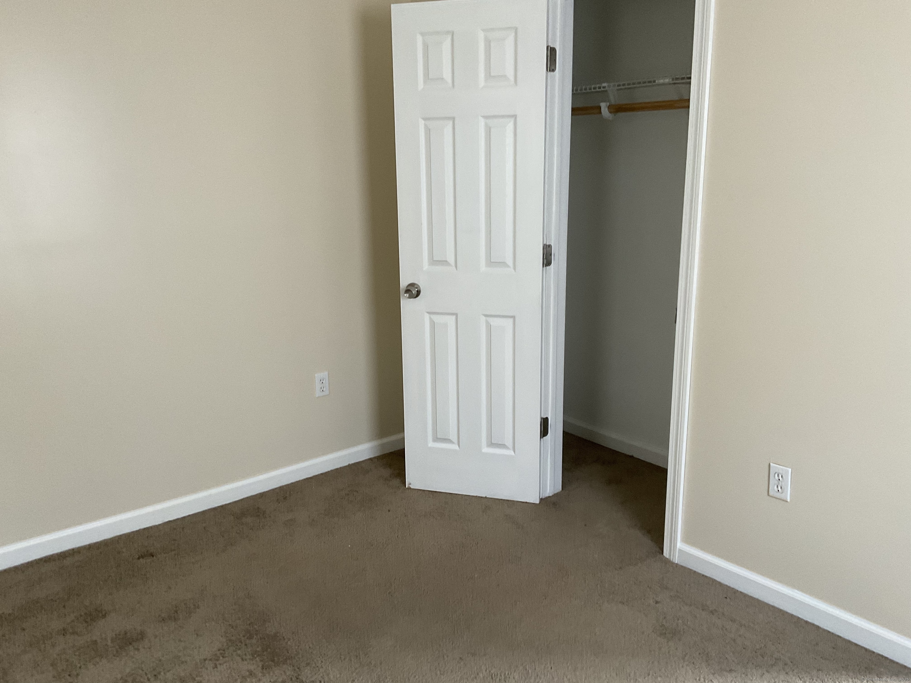 22 Oak Street Naugatuck, CT 06770 - Photo 5 of 7 an empty room with windows