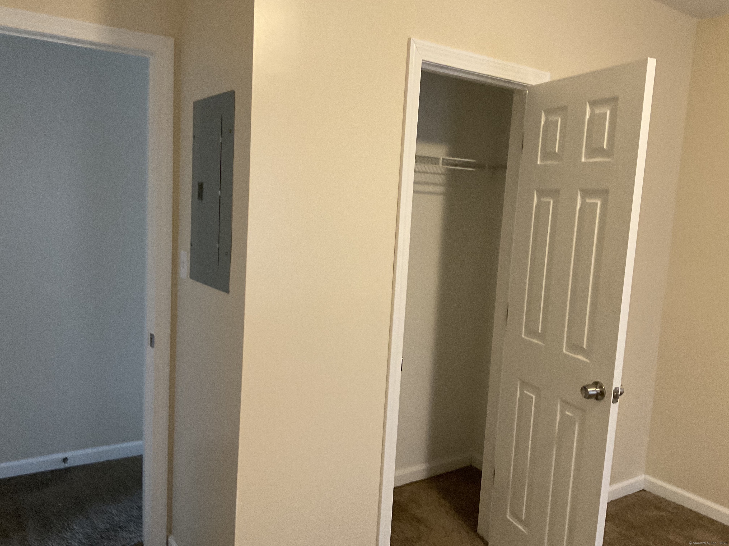 22 Oak Street Naugatuck, CT 06770 - Photo 6 of 7 a view of a hallway with wooden floor