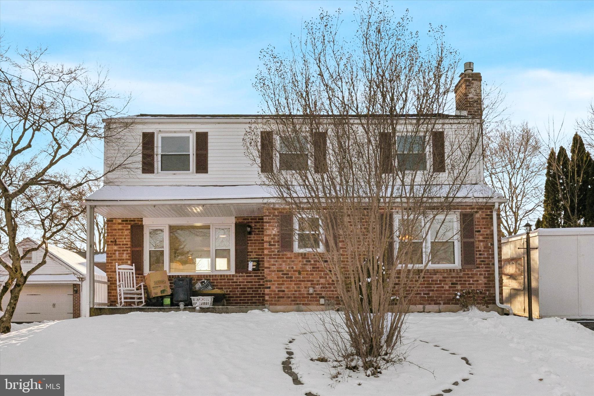 725 Springdell Road King of Prussia, PA 19406 - Photo 2 of 29 a front view of a house with a yard