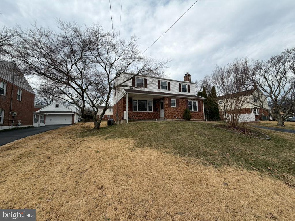 725 Springdell Road King of Prussia, PA 19406 - Photo 2 of 31 a front view of a house with a yard