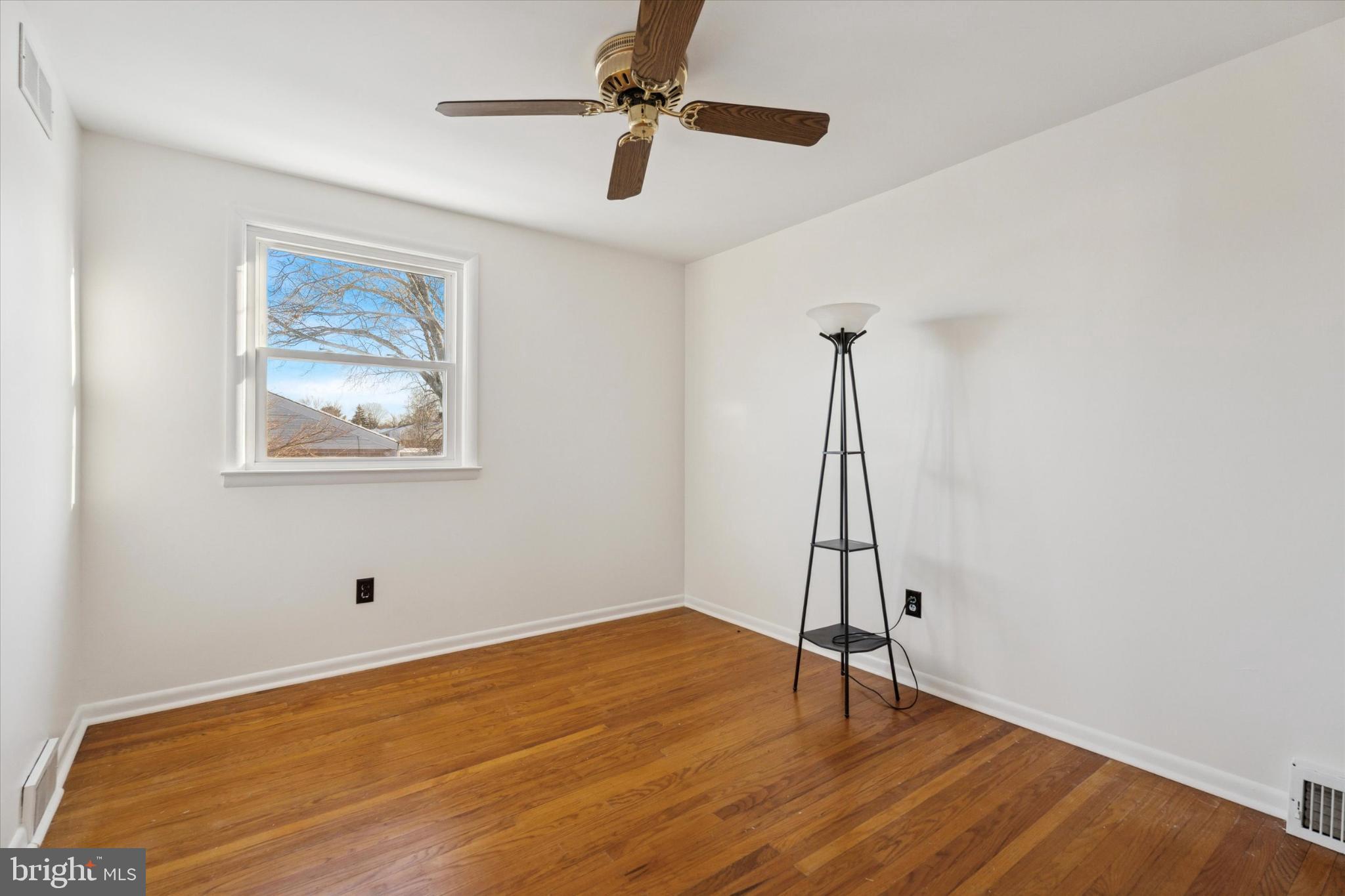 725 Springdell Road King of Prussia, PA 19406 - Photo 22 of 31 a view of room with wooden floor and ceiling fan
