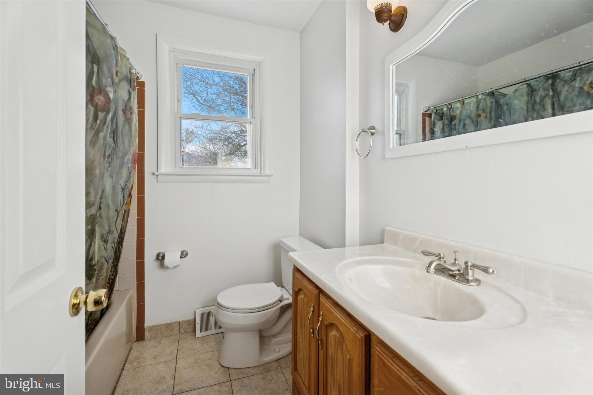 725 Springdell Road King of Prussia, PA 19406 - Photo 27 of 31 a bathroom with a sink a toilet and shower
