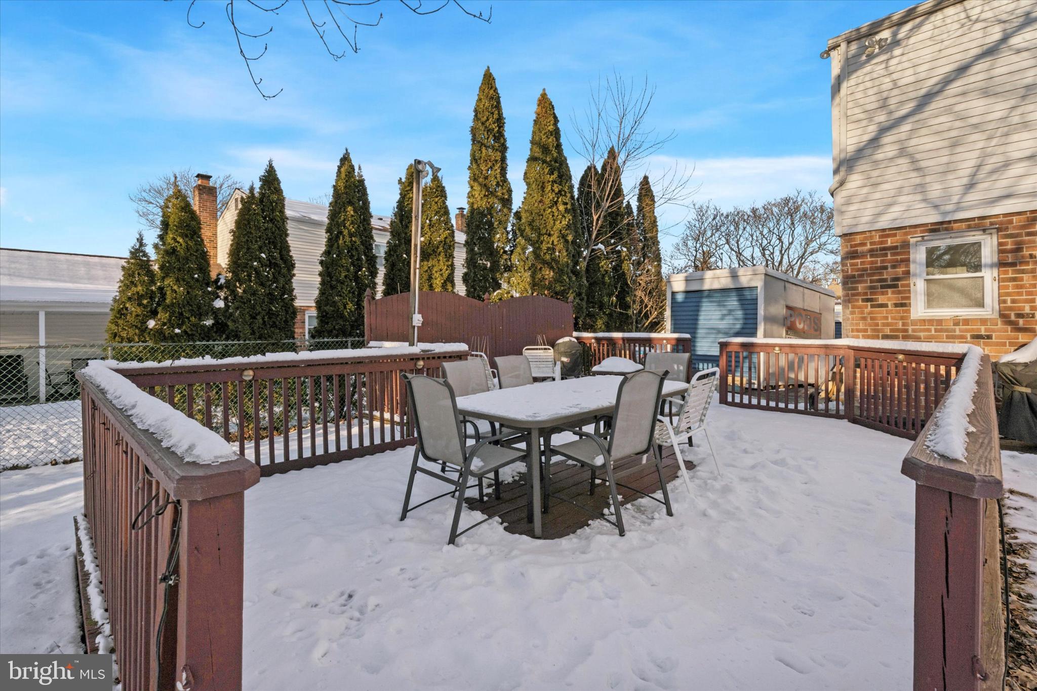 725 Springdell Road King of Prussia, PA 19406 - Photo 4 of 29 a view of a patio with a table chairs and couches