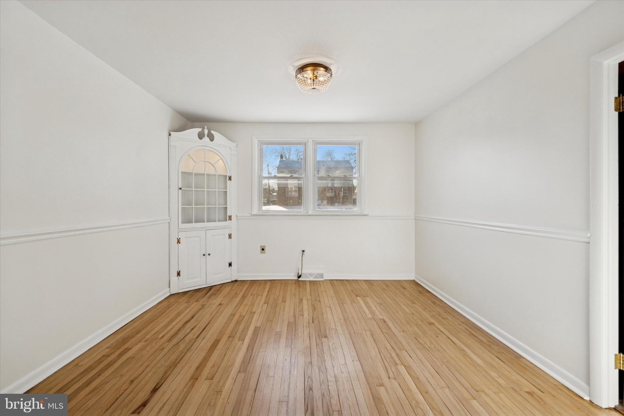 725 Springdell Road King of Prussia, PA 19406 - Photo 10 of 29 a view of empty room with wooden floor and fan