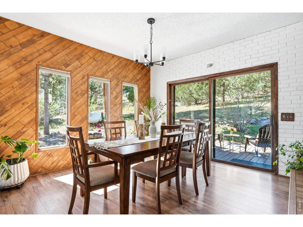 5 Mohawk Road Lyons, CO 80540 - Photo 5 of 49 Dining with light and a tranquil view.