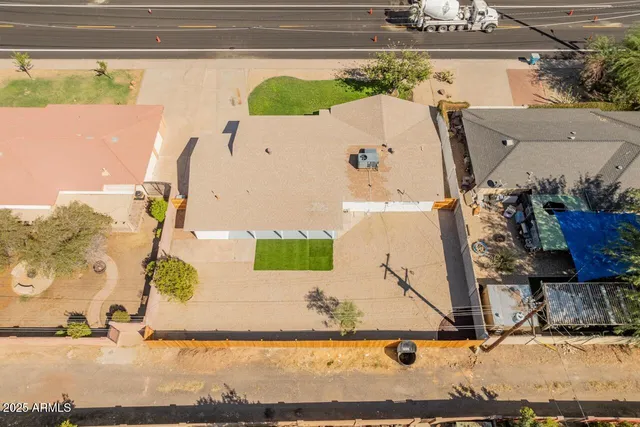 a picture of a bathroom with a sink and mirror