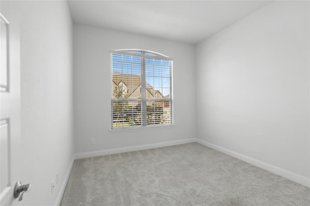 3811 Pepper Grass Lane Prosper, TX 75078 - Photo 14 of 40 an empty room with a window