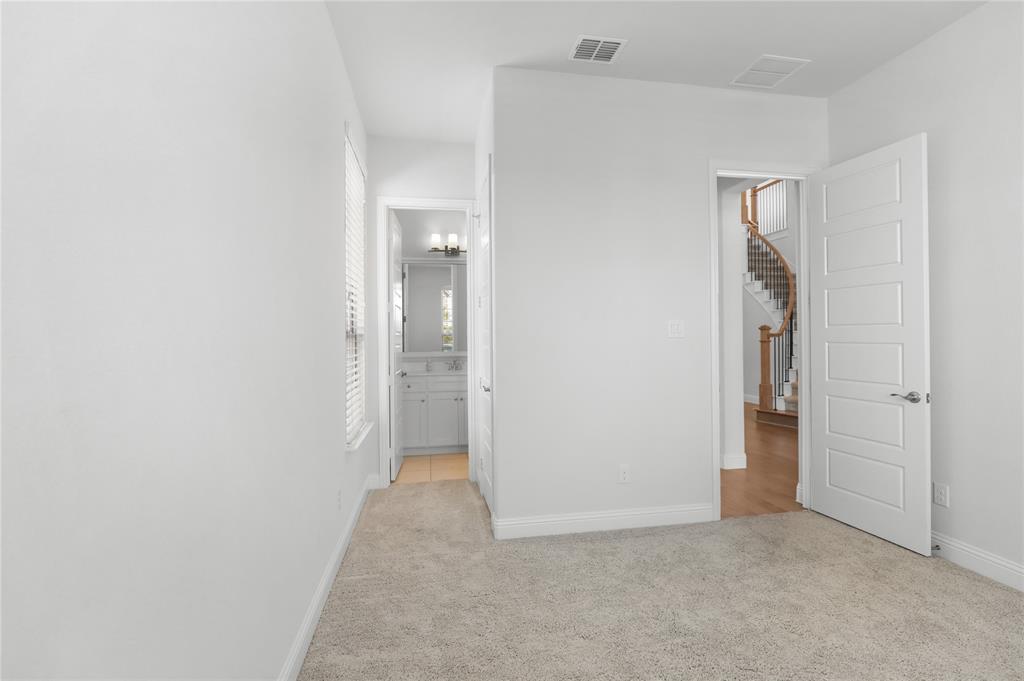 3811 Pepper Grass Lane Prosper, TX 75078 - Photo 15 of 40 an empty room with a bathroom and a sink