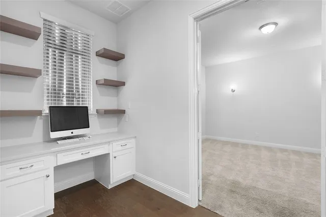 a view of cabinets with sink