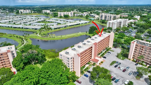 an aerial view of a house with outdoor space