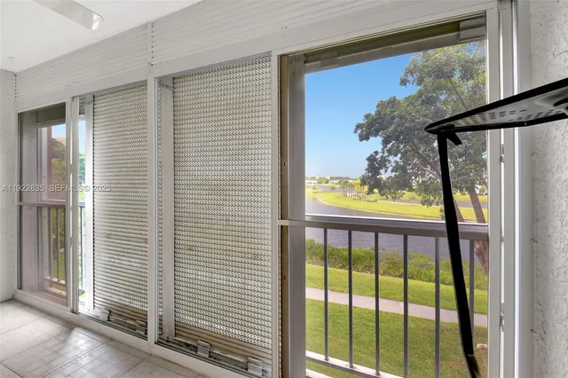 a view of a porch with a door and a porch
