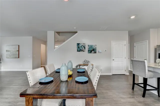 a bathroom with a sink a mirror and a toilet