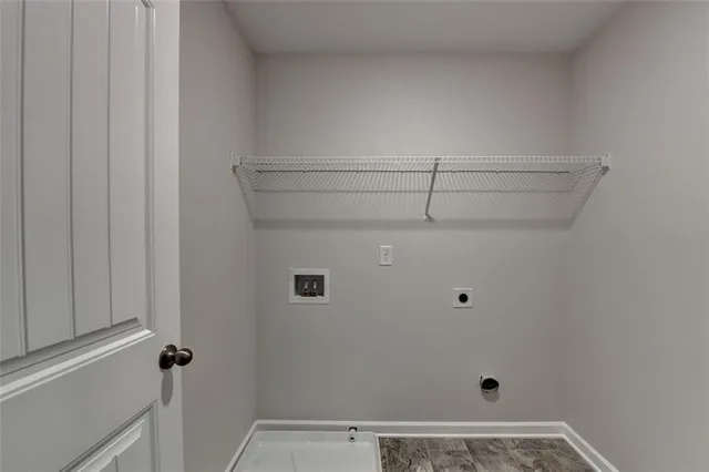 a workspace with furniture and a potted plant