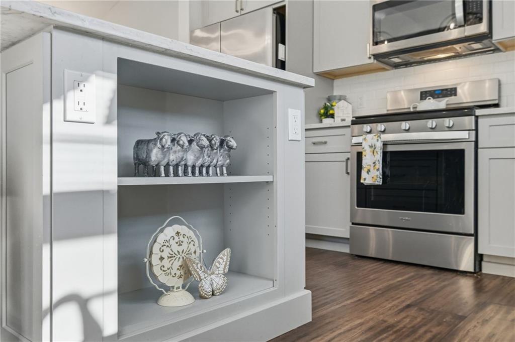 3561 Cedar Ridge Road Allison Park, PA 15101 - Photo 26 of 50 Open shelving at the end of the island offers flexible storage and display.