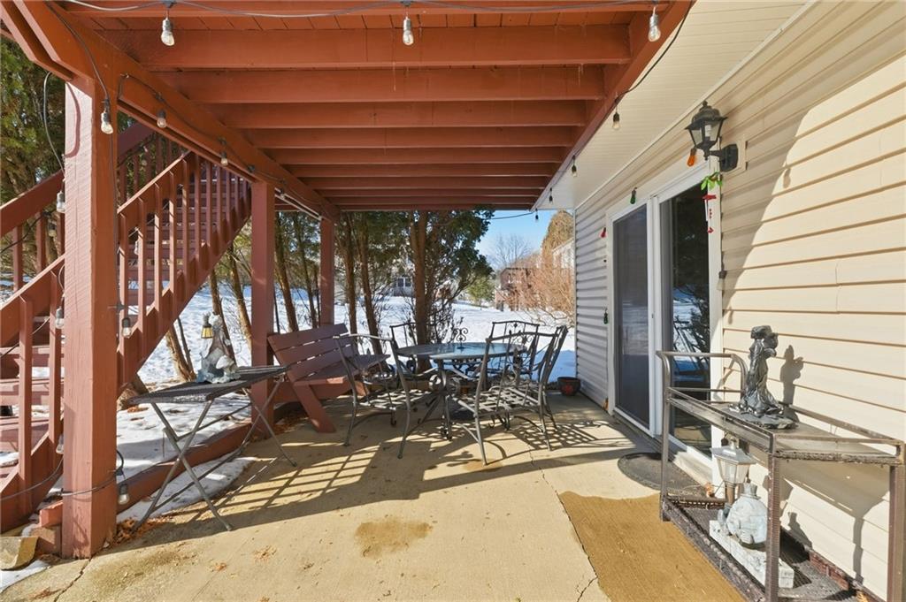 3561 Cedar Ridge Road Allison Park, PA 15101 - Photo 45 of 50 An under-deck concrete patio expands outdoor entertaining options.