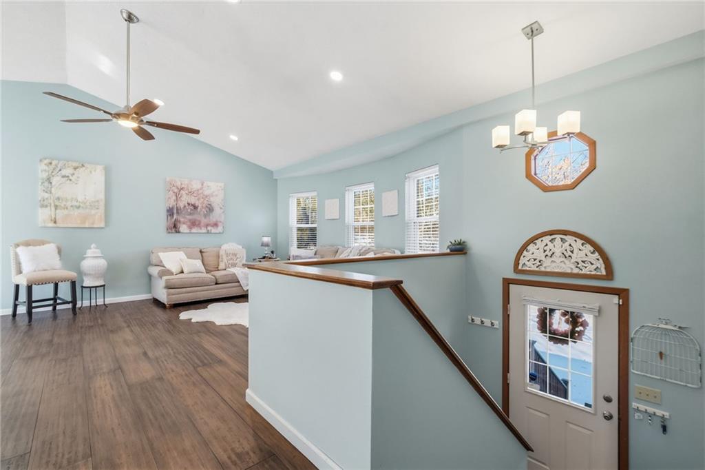 3561 Cedar Ridge Road Allison Park, PA 15101 - Photo 7 of 50 Light-filled open living with dramatic peaked cathedral ceilings.