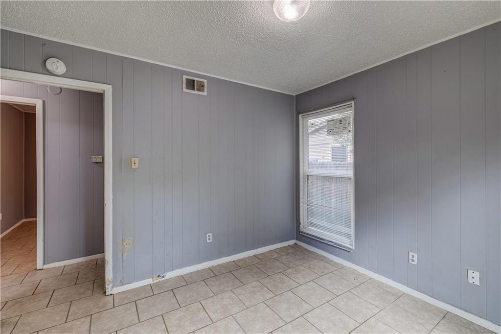 1006 Fiesta Street, Unit A Austin, TX 78702 - Photo 12 of 12 a view of an empty room and window