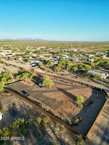 an aerial view of residential building and ocean