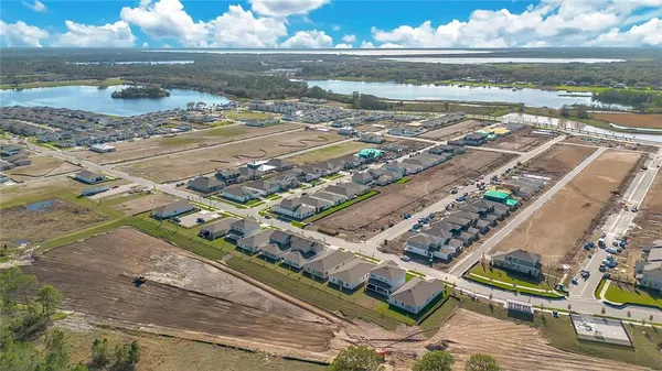 a view of a lake with a yard