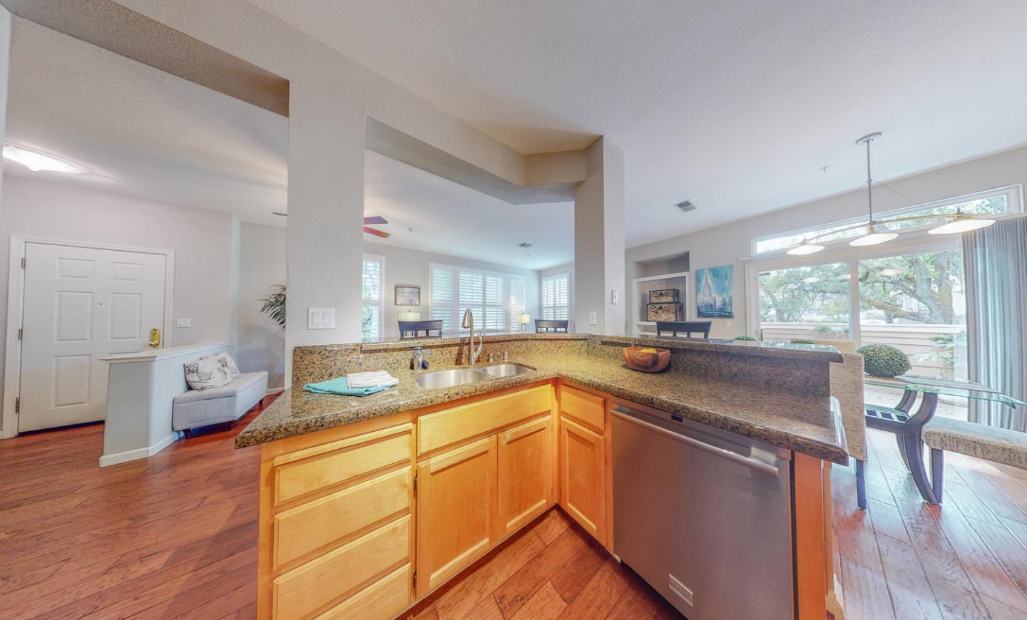 1720 Cutter Court San Ramon, CA 94583 - Photo 12 of 32 a kitchen with stainless steel appliances granite countertop sink stove and wooden floor
