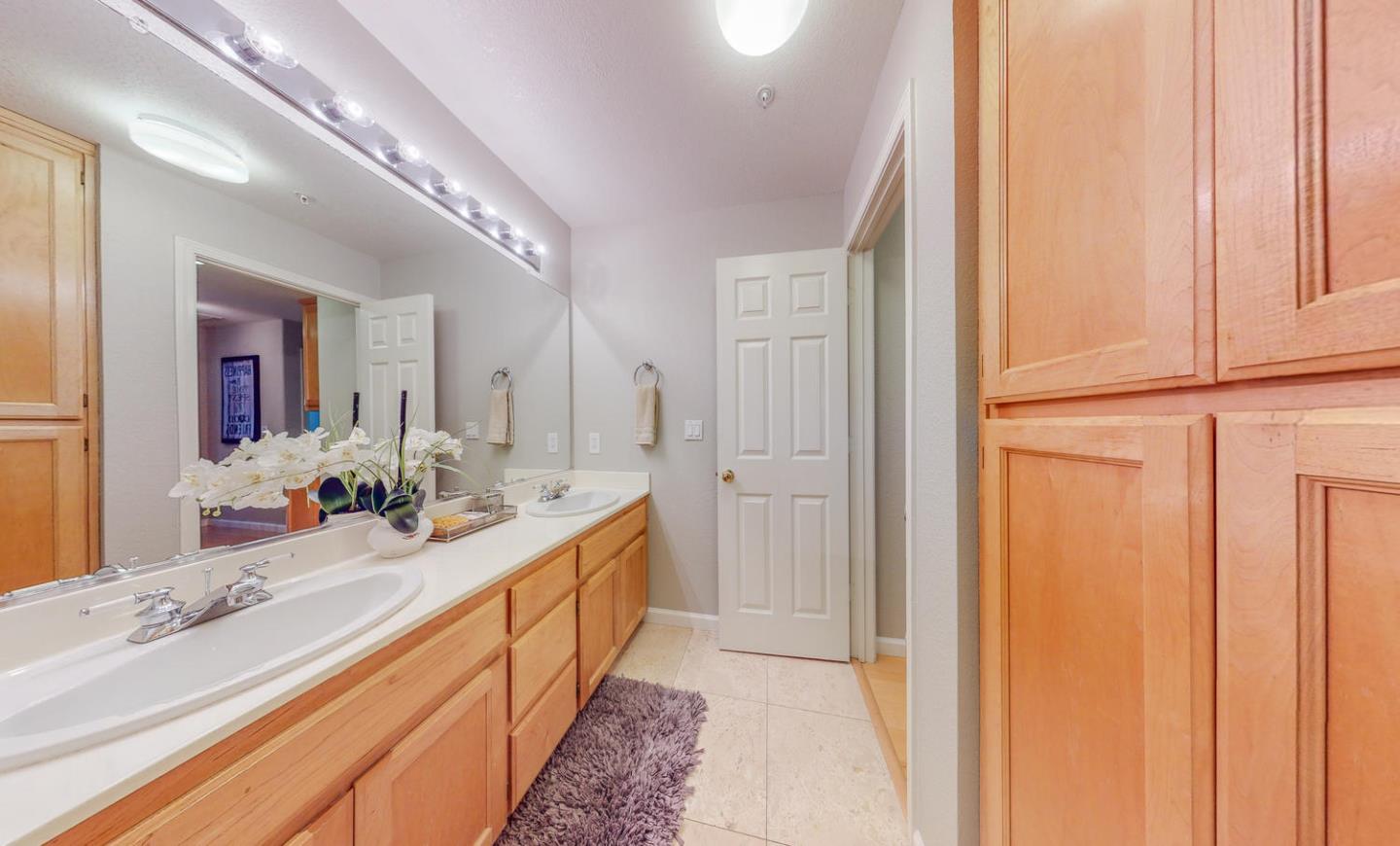 1720 Cutter Court San Ramon, CA 94583 - Photo 26 of 32 a spacious bathroom with a double vanity sink and mirror