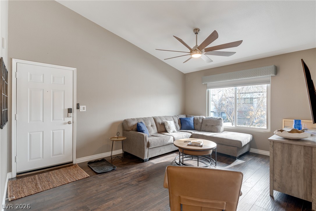 7255 West Sunset Road, Unit 2155 Las Vegas, NV 89113 - Photo 7 of 21 Living room with dark wood finished floors, a ceiling fan, and high vaulted ceiling