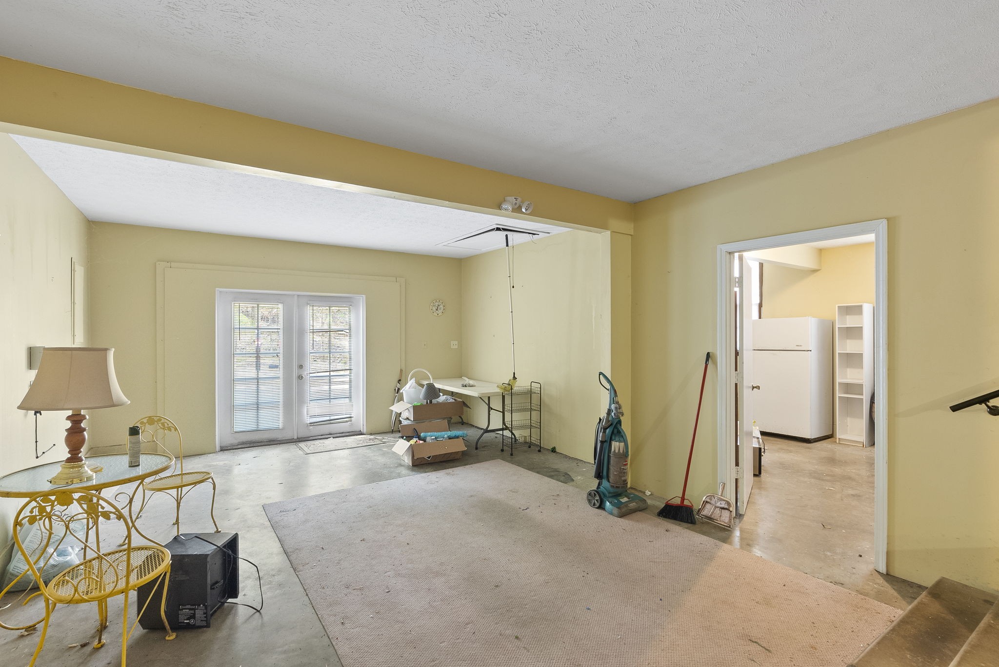 1628 Butler Mill Hollow Road Bethpage, TN 37022 - Photo 14 of 14 a spacious bedroom with a bed and large windows