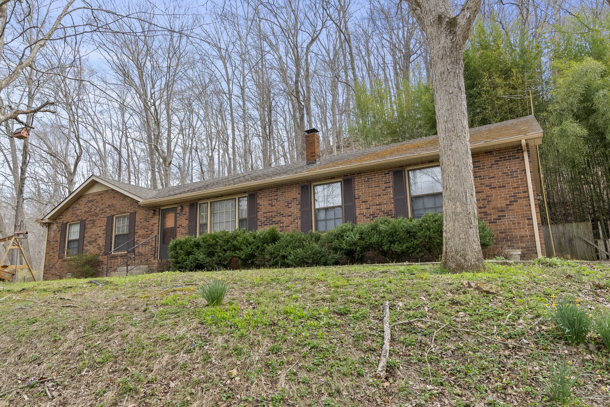 1628 Butler Mill Hollow Road Bethpage, TN 37022 - Photo 2 of 14 a front view of a house with garden