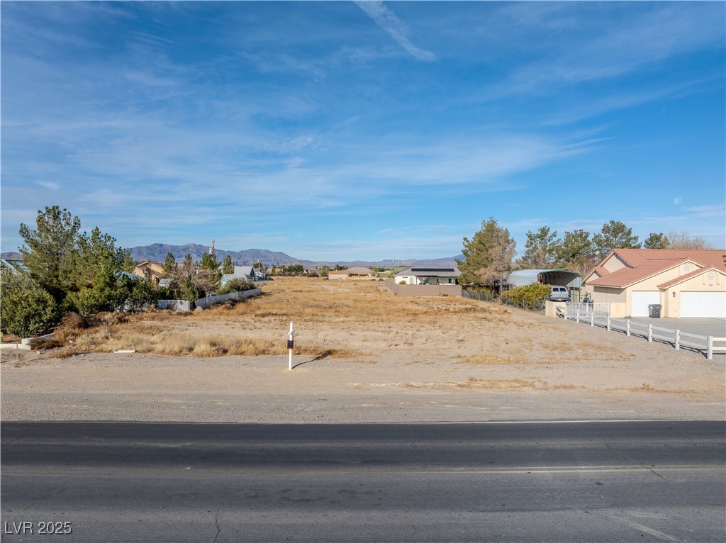 1930 South Blagg Road Pahrump, NV 89048 - Photo 11 of 11 View of yard with a mountain view