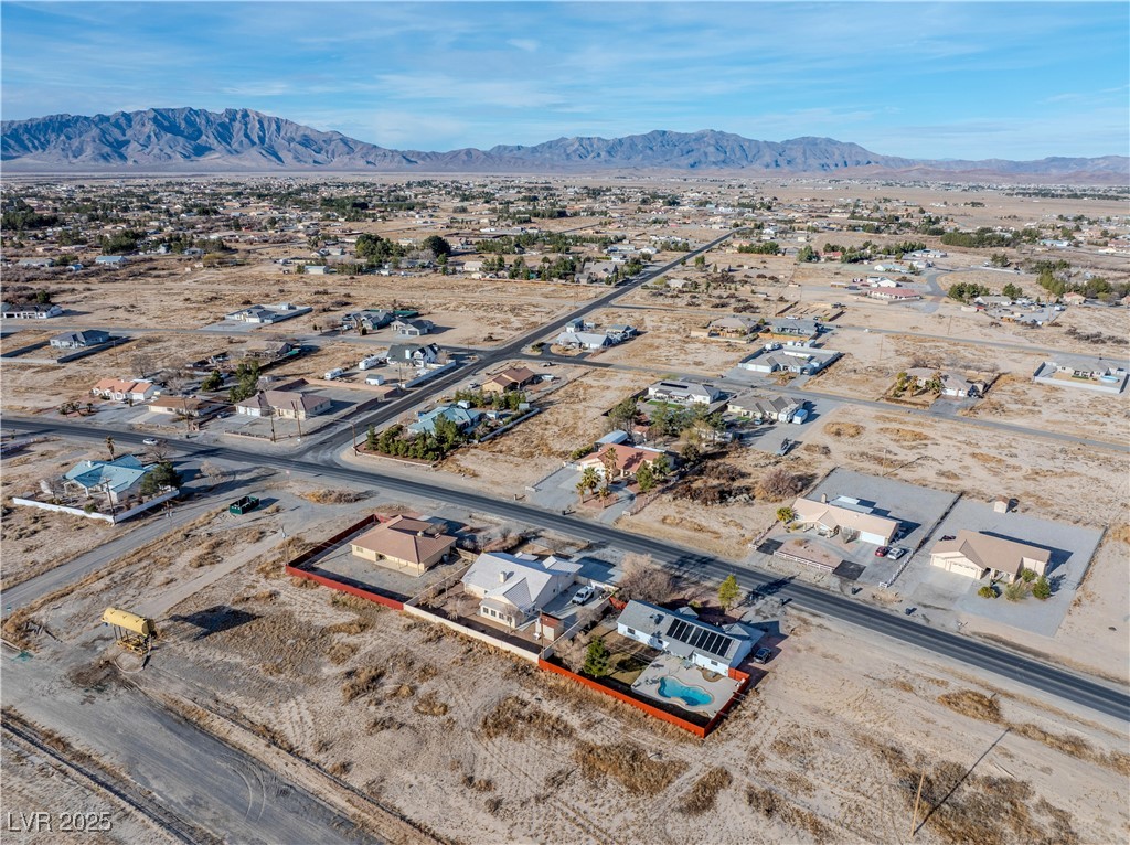 1930 South Blagg Road Pahrump, NV 89048 - Photo 9 of 11 Birds eye view of property with a mountain view