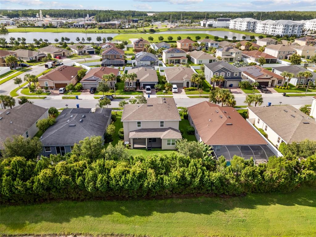 12124 Lake Boulevard Trinity, FL 34655 - Photo 17 of 31 an aerial view of residential houses with outdoor space and river