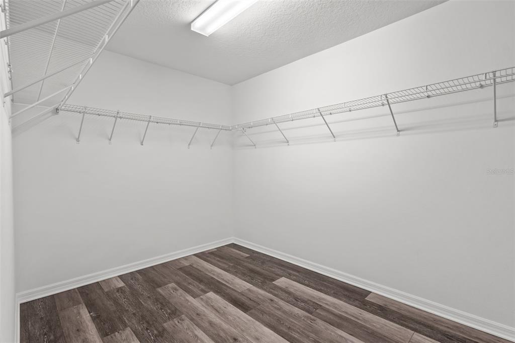 12124 Lake Boulevard Trinity, FL 34655 - Photo 23 of 31 a view of a room with racks on the wall