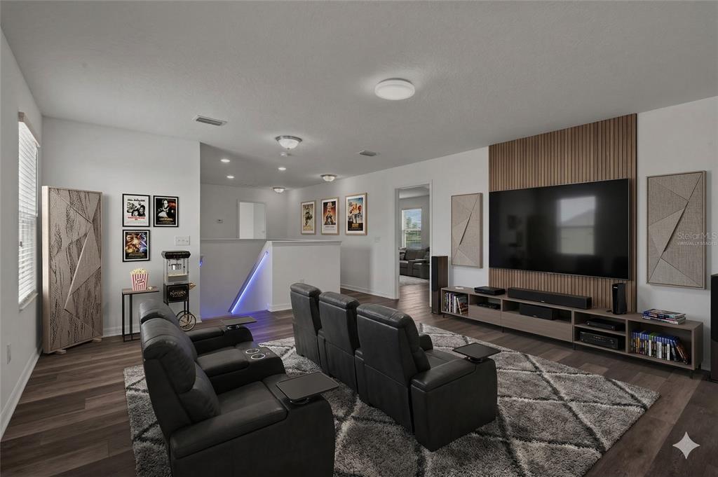 12124 Lake Boulevard Trinity, FL 34655 - Photo 5 of 31 a living room with furniture and a flat screen tv