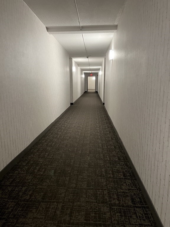 1550 Worcester Road, Unit 114 Framingham, MA 01702 - Photo 16 of 29 a view of a hallway
