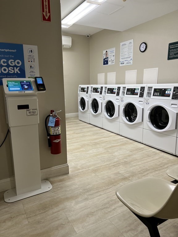 1550 Worcester Road, Unit 114 Framingham, MA 01702 - Photo 23 of 29 a utility room with dryer and washer