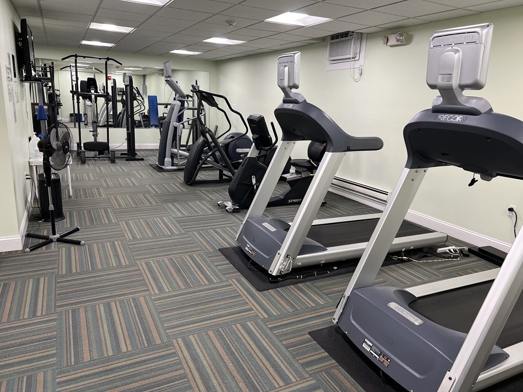 1550 Worcester Road, Unit 114 Framingham, MA 01702 - Photo 25 of 29 a view of a room with gym equipment