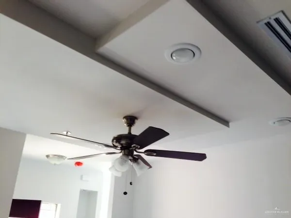 a bathroom with a mirror and a shower