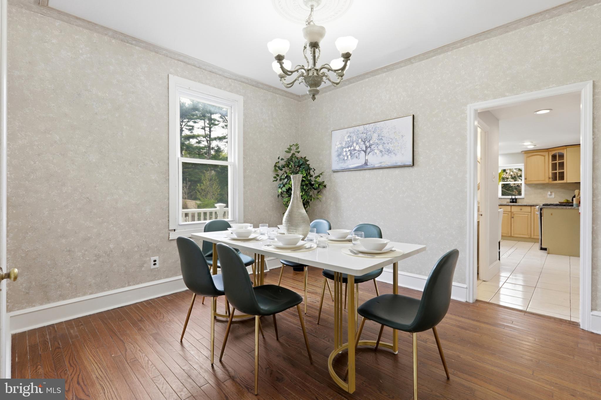 718 Chestnut Avenue Laurel Springs, NJ 08021 - Photo 12 of 49 a view of a dining room with furniture window and wooden floor