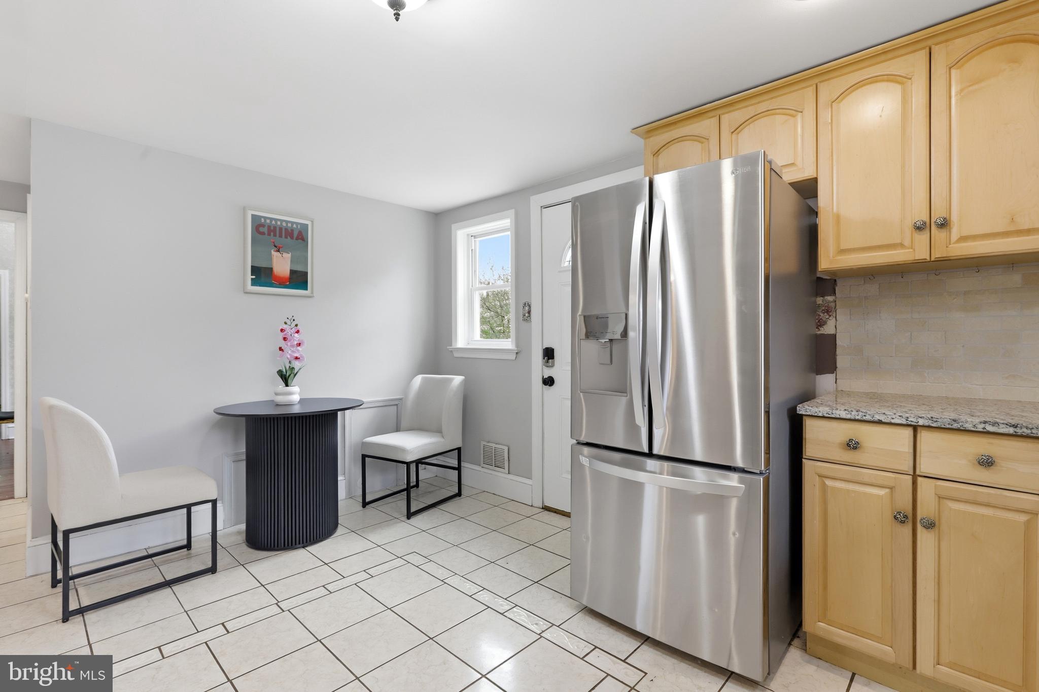 718 Chestnut Avenue Laurel Springs, NJ 08021 - Photo 15 of 49 a kitchen with stainless steel appliances a refrigerator and cabinets