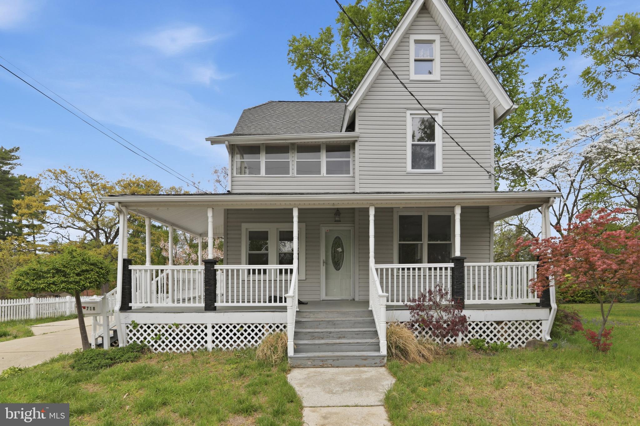 718 Chestnut Avenue Laurel Springs, NJ 08021 - Photo 2 of 49 a front view of a house with a garden