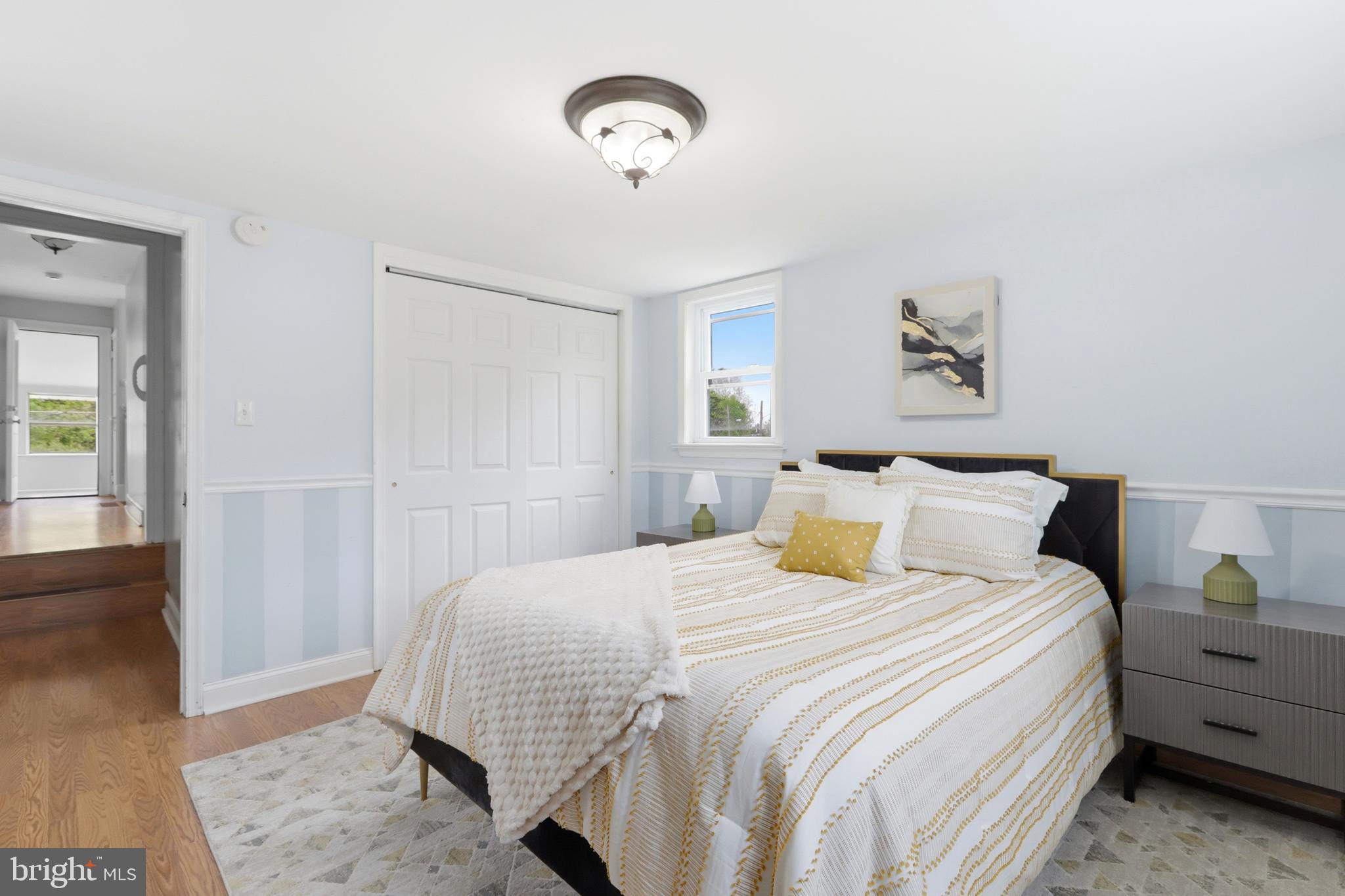 718 Chestnut Avenue Laurel Springs, NJ 08021 - Photo 23 of 49 a bedroom with a bed and a painting on the wall