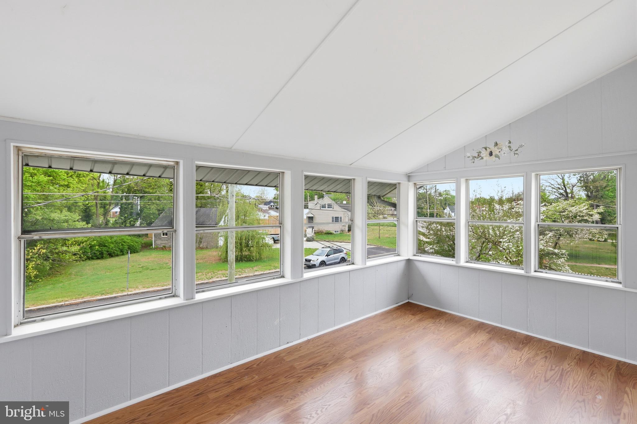 718 Chestnut Avenue Laurel Springs, NJ 08021 - Photo 34 of 49 a view of an empty room with large windows